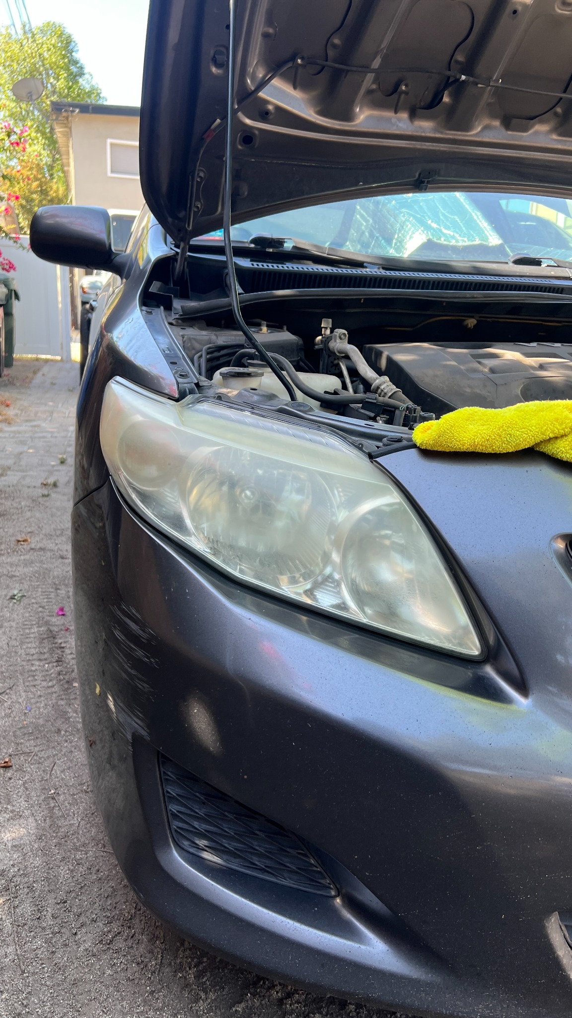 Cloudy oxidized headlight before restoration